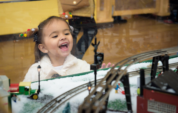 Girl looking at train