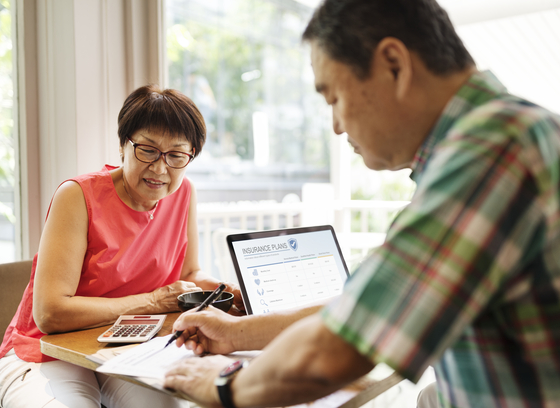 senior man and woman working together