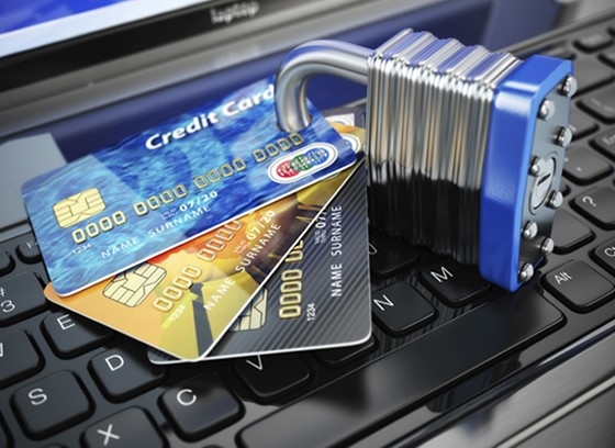 Image of credit cards with a lock around them.