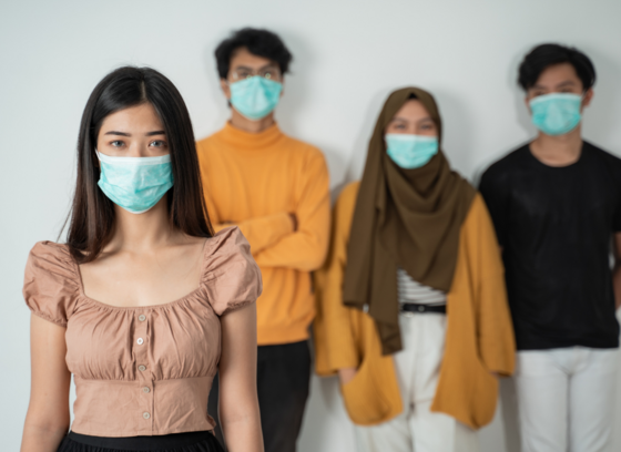 stock image of diverse people in masks