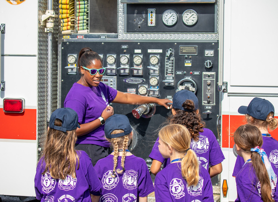 Campers learn about fire engine at First Alarm Fire Camp