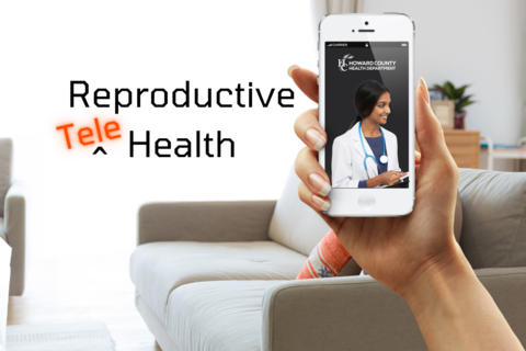 Hand holding a cell phone with image of healthcare-provider. Reproductive telehealth